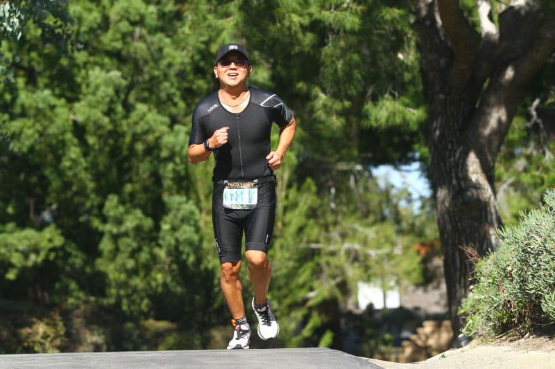 Vang Her running in the Orange County Triathlon in 2021. (Photo courtesy of Scott Stolarz/SCS)